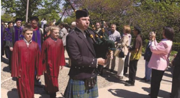 Pipe Major Bill Collins, leading MSU College of Law graduation procession, 2005